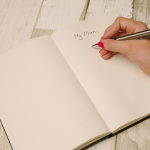 Child practicing writing in a notebook showing that all writing is good writing